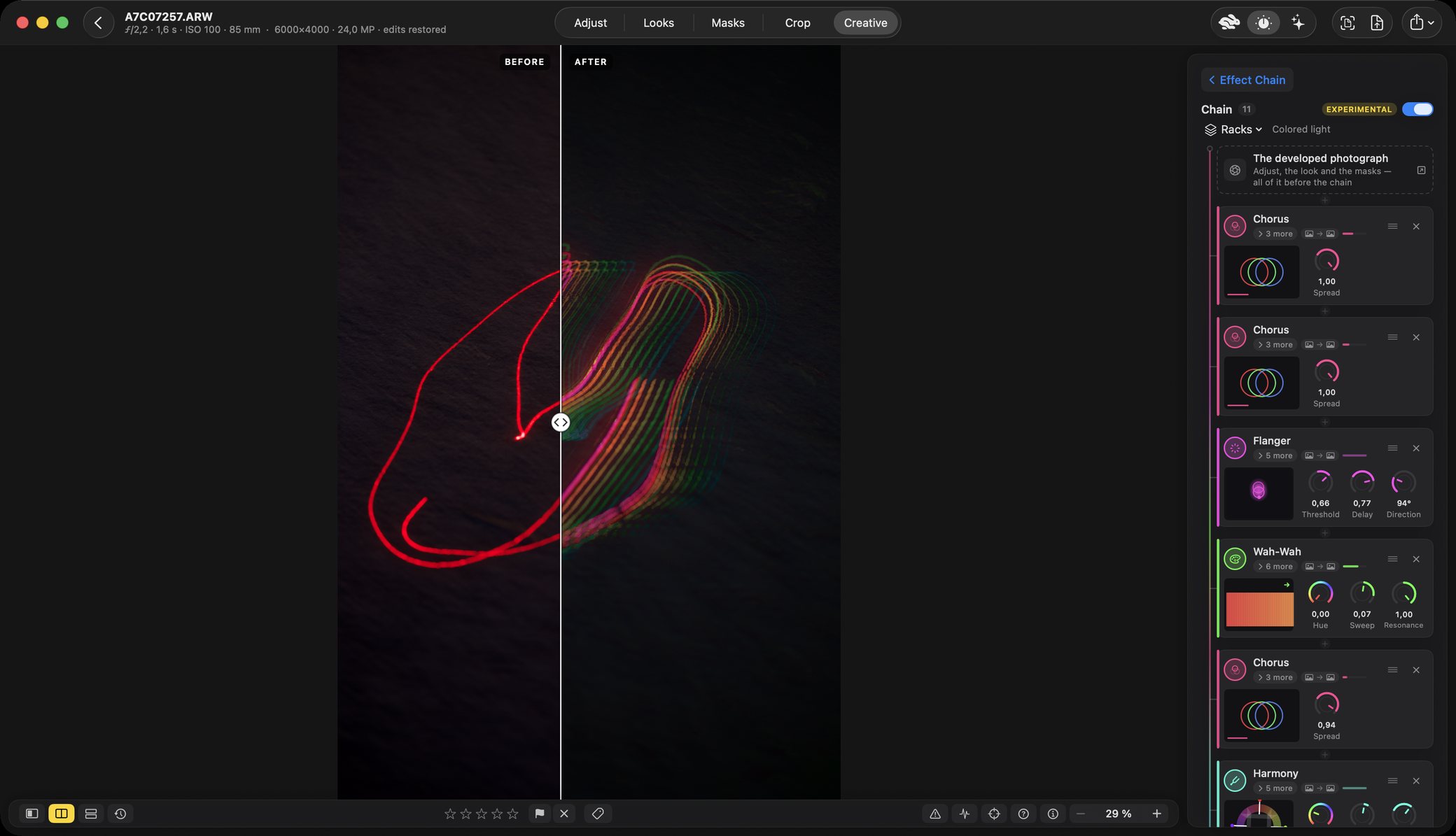 A long-exposure photograph split before and after: on the left a red line drawn in the dark, on the right the same line repeated into many offset copies in green, yellow and pink. The panel is headed Chain and holds a stack of units — Chorus, Flanger, Wah-Wah, Harmony — each with knobs.